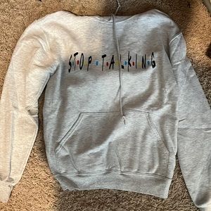 grey “stop talking” friends based coaches sweatshirt